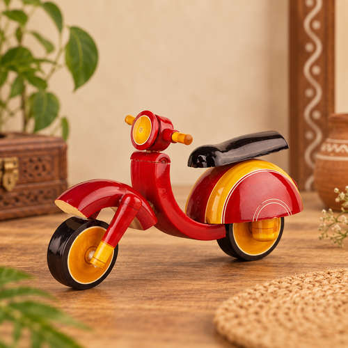 Etikoppaka-style wooden scooty toy in red yellow and black